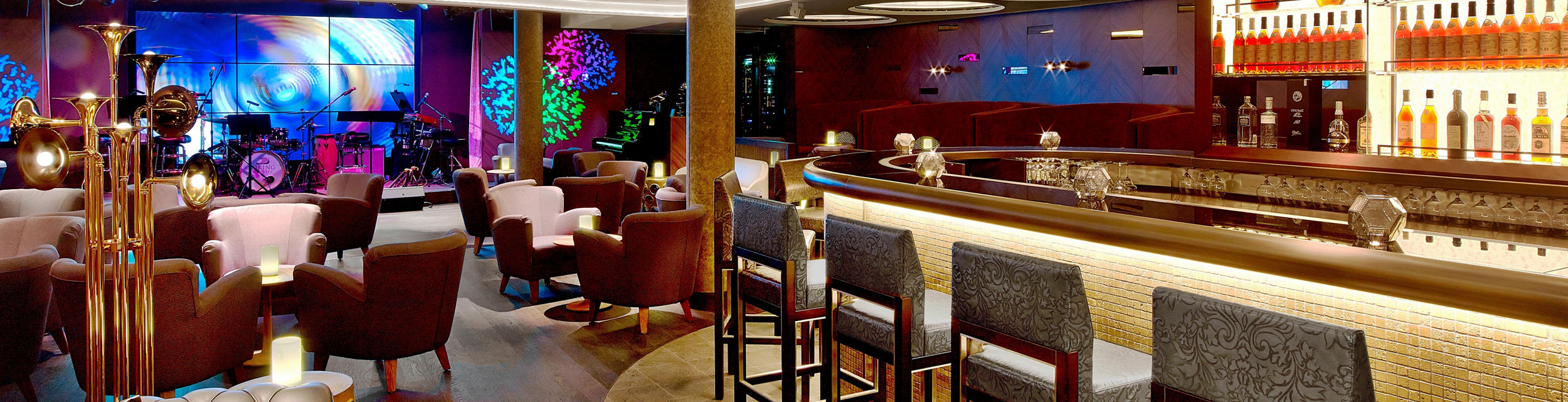 Modern lounge bar with vibrant lighting