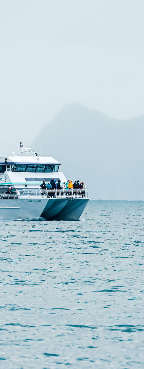 Tour boat cruising on open water