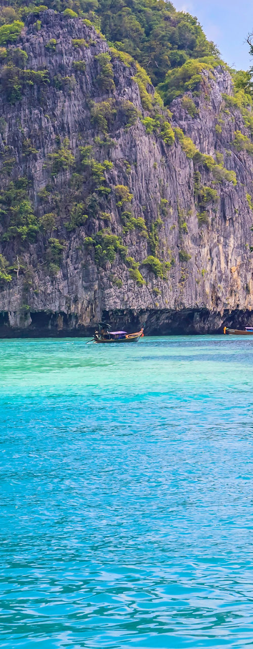 Speedboat cruising through tropical lagoon