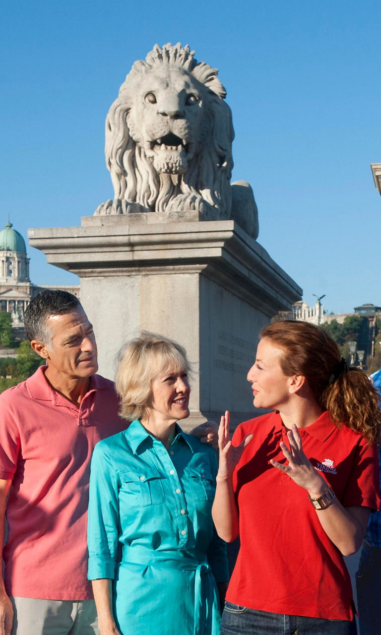Group sightseeing near historic bridge in Budapest
