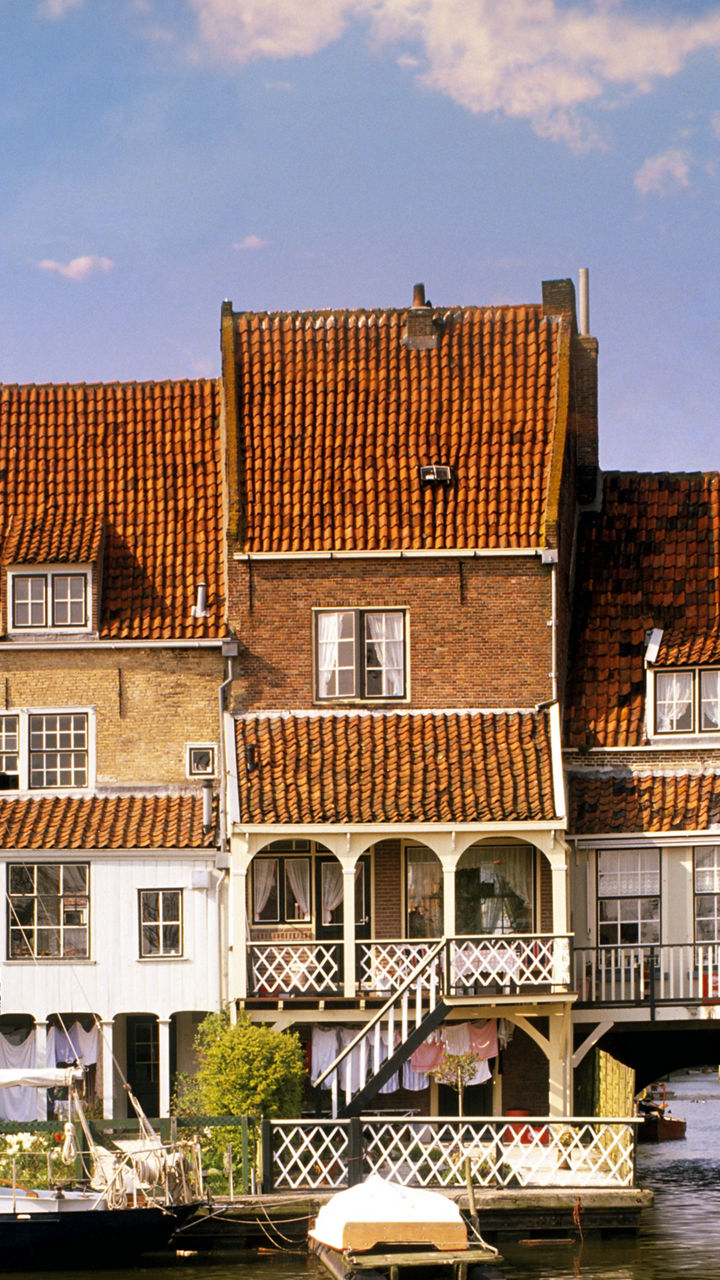 Historic canal houses with moored boats