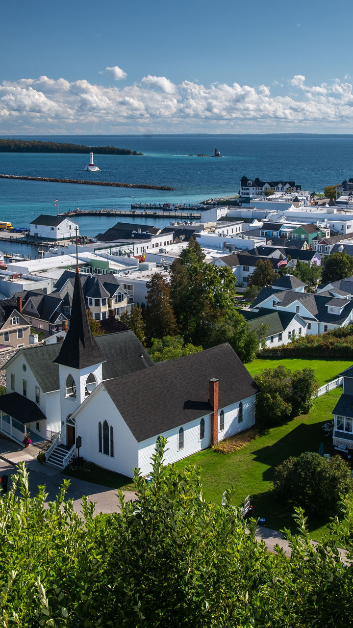 Scenic coastal town with lighthouse view
