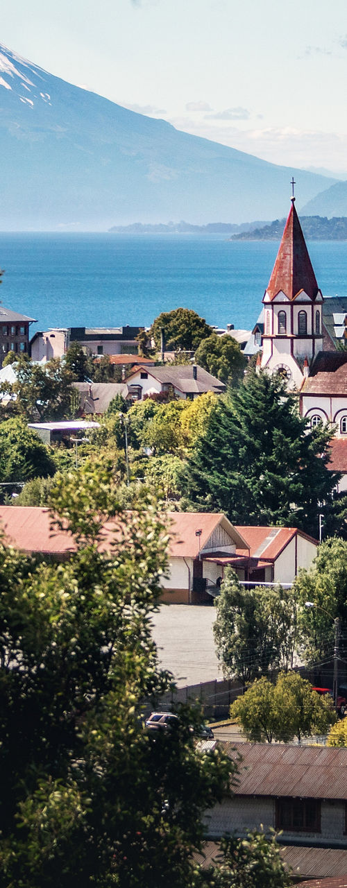 Scenic town with volcano and lake view