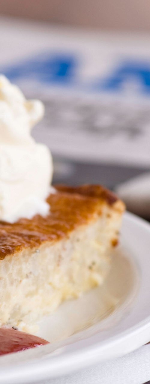 Dessert with cream and berry sauce