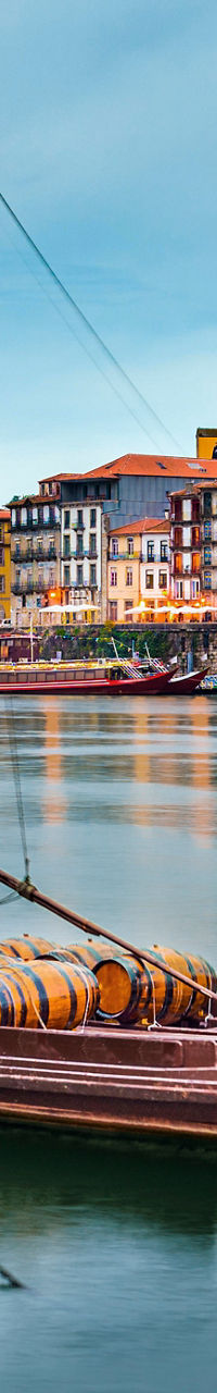 Traditional boats on serene river in Porto