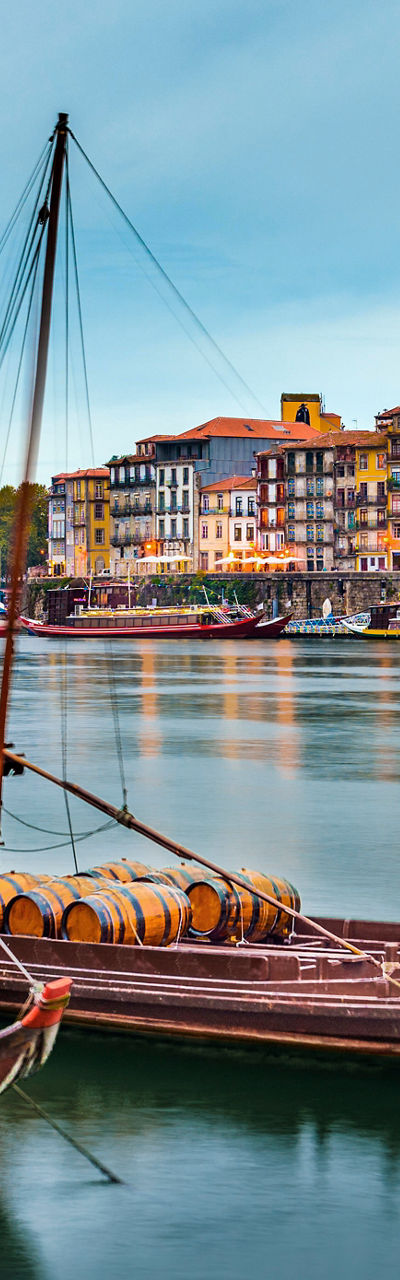 Traditional boats on serene river in Porto