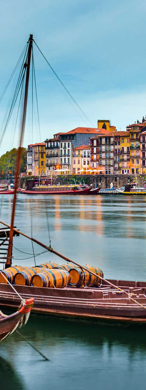 Traditional boats on serene river in Porto