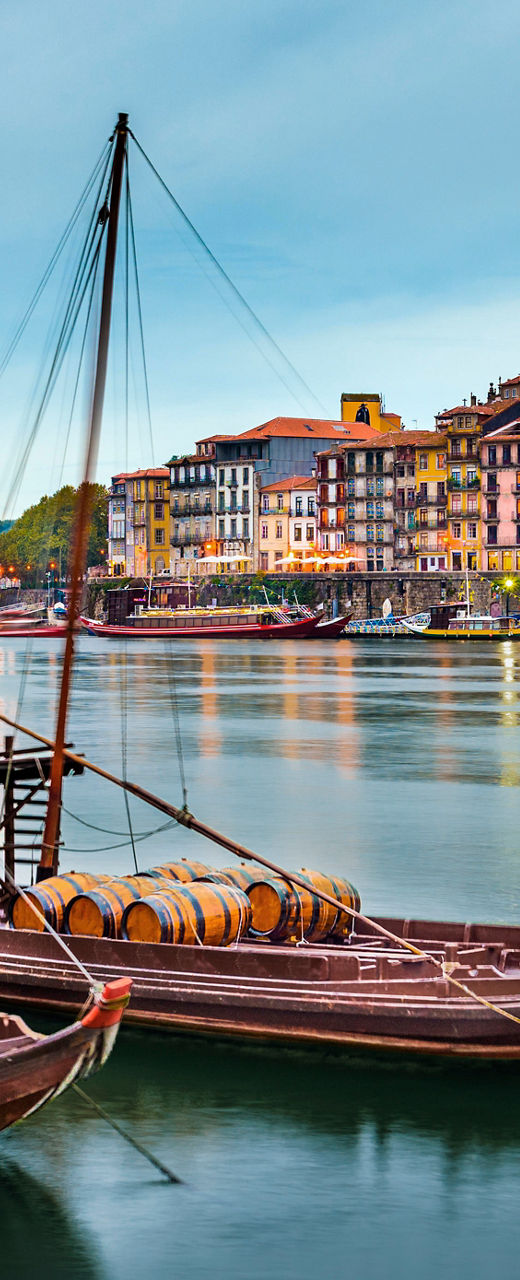 Traditional boats on serene river in Porto
