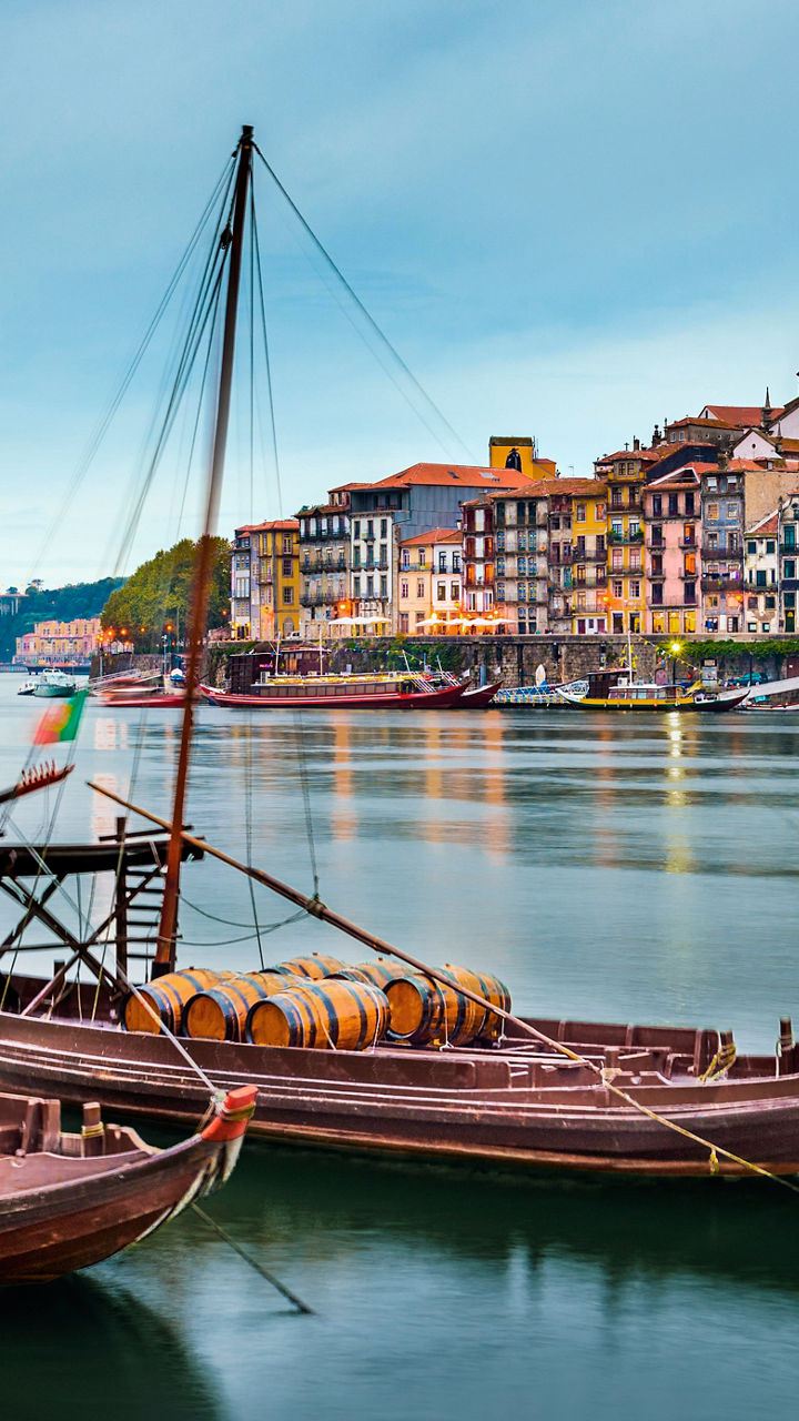 Traditional boats on serene river in Porto
