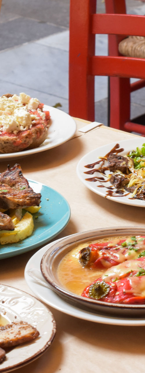 Mediterranean feast with wine on table