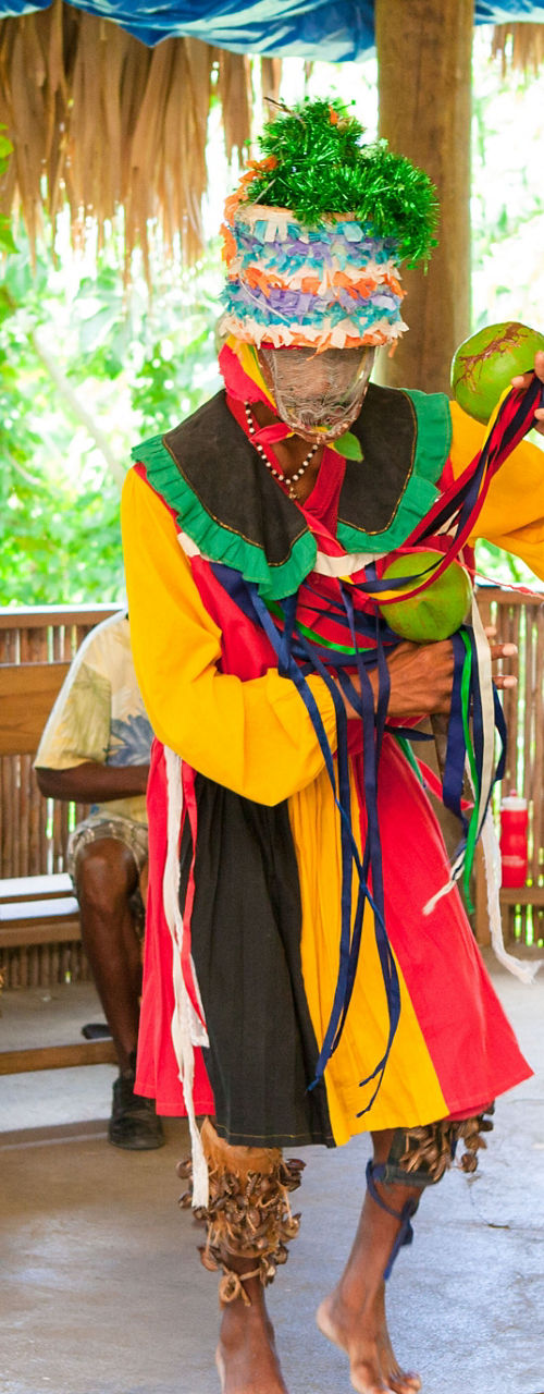Traditional dance performance in tropical setting