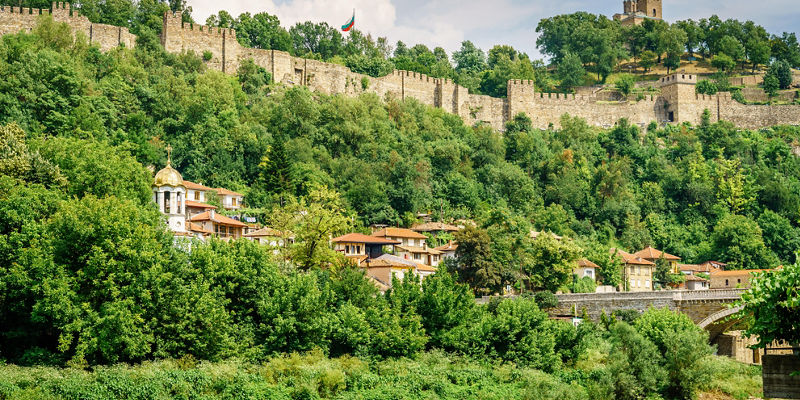 Historic fortress overlooking lush green landscape