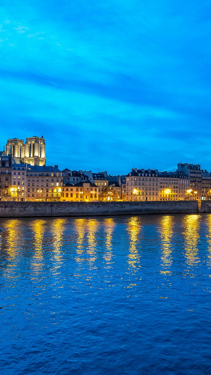 Seine River at dusk with city lights
