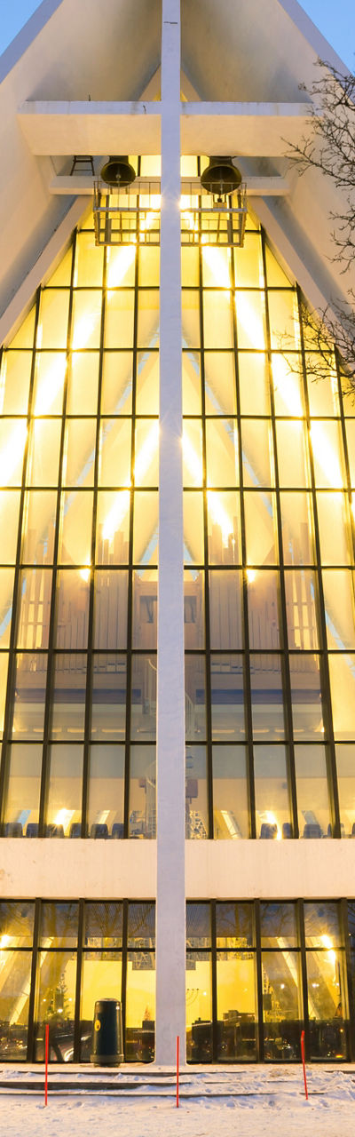 Modern triangular church in snowy landscape