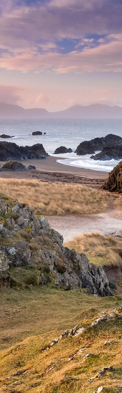 Scenic lighthouse on rocky coastal landscape