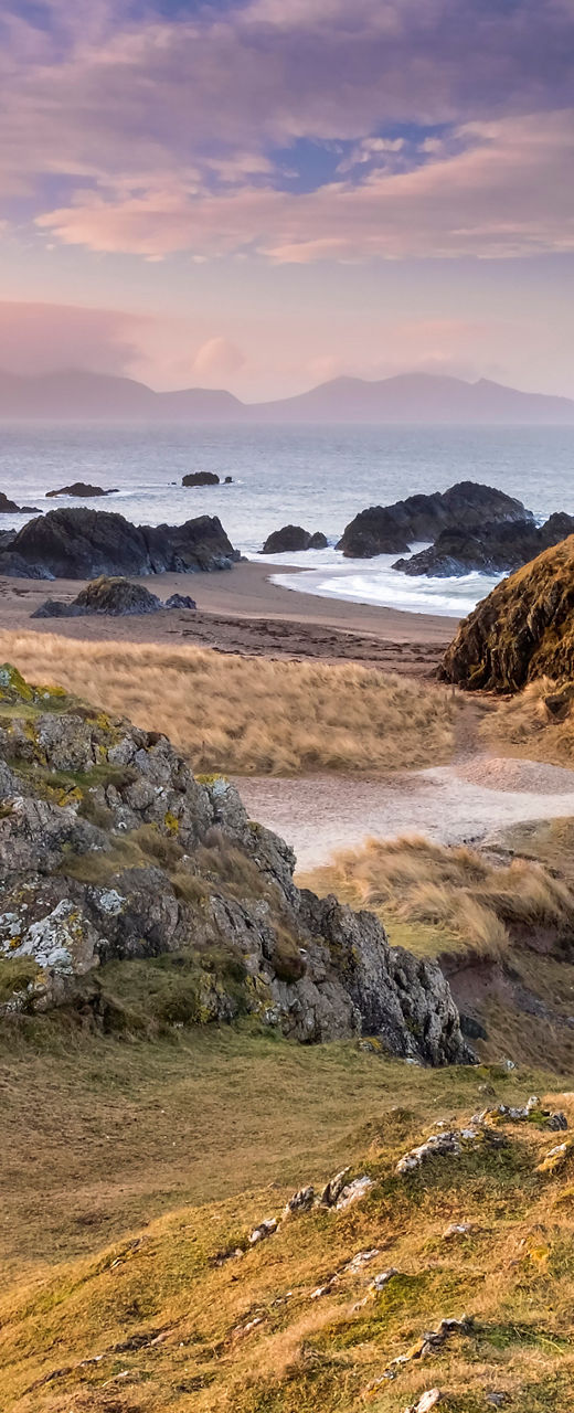 Scenic lighthouse on rocky coastal landscape