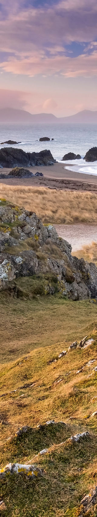 Scenic lighthouse on rocky coastal landscape