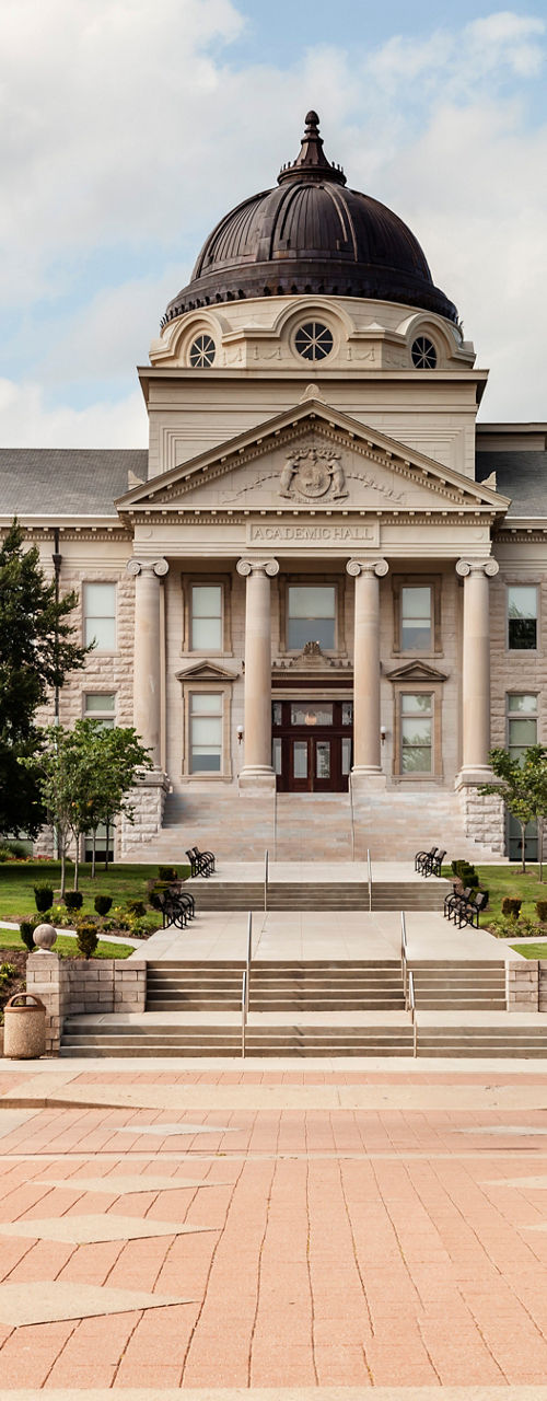 Historic courthouse with dome and flag