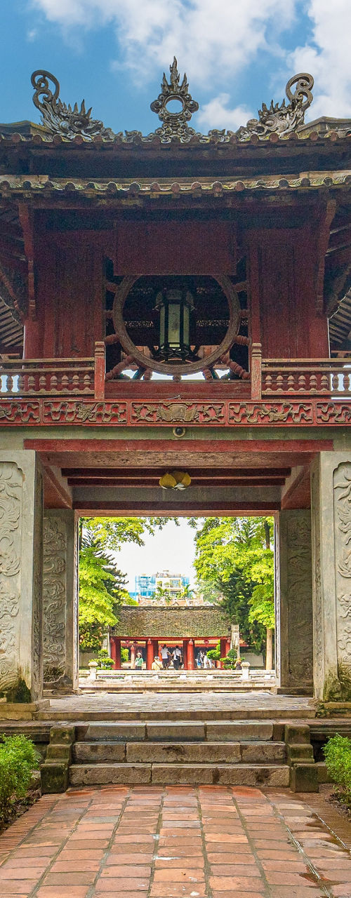 Ancient Temple Gate in Lush Garden Setting