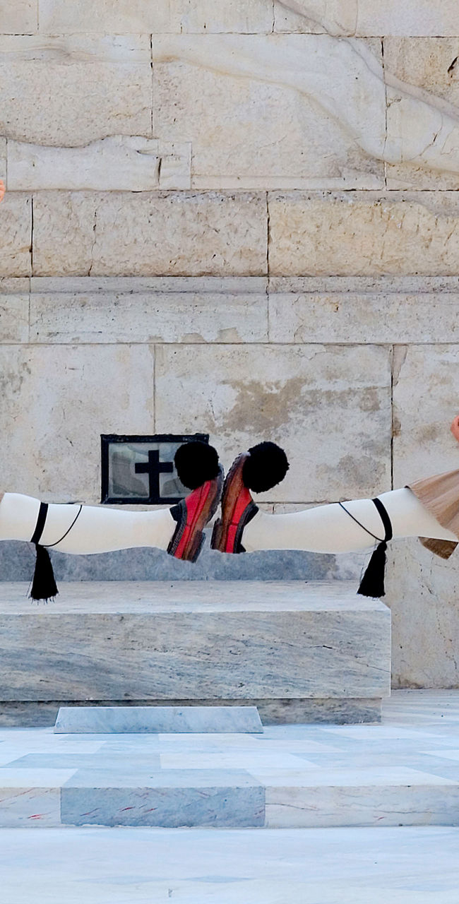 Greek ceremonial guards performing synchronized routine