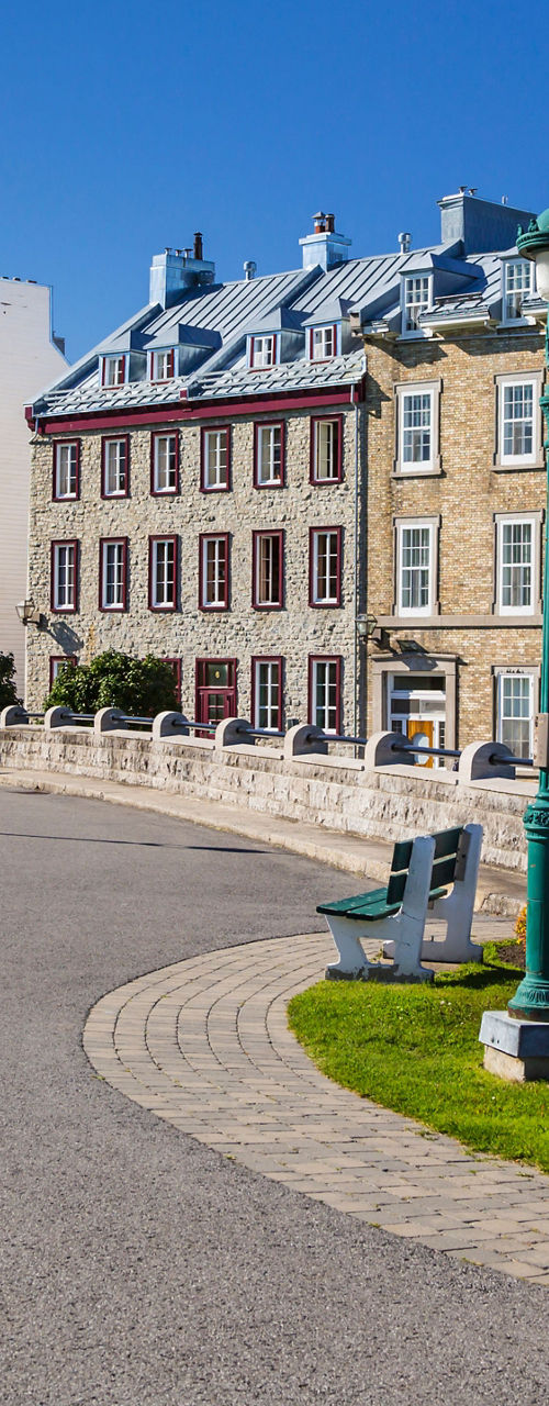 Historic street with colorful buildings and benches