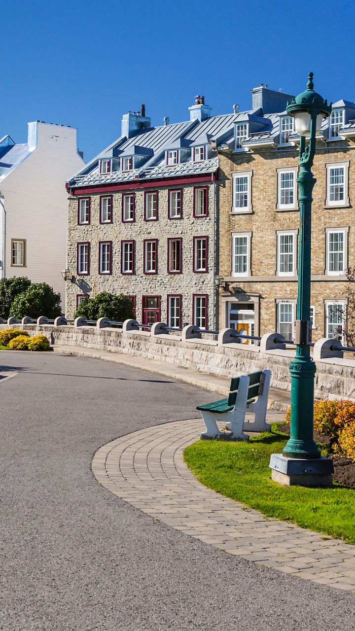 Historic street with colorful buildings and benches
