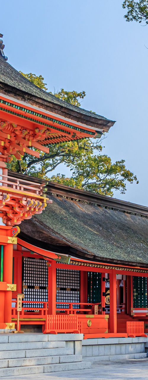 Traditional Japanese Shrine with Vibrant Red Architecture