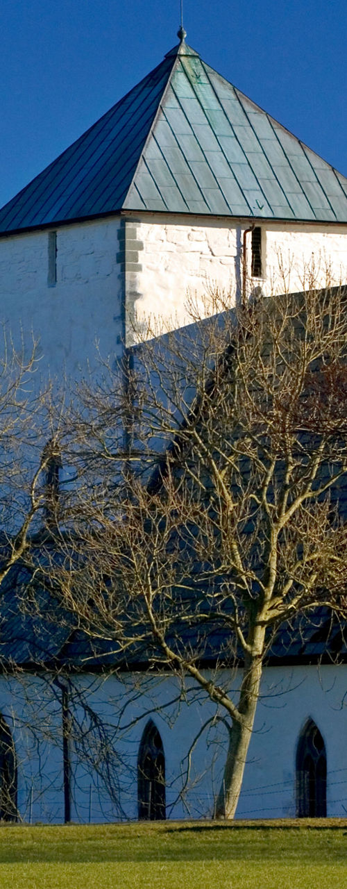 Historic white church in rural setting
