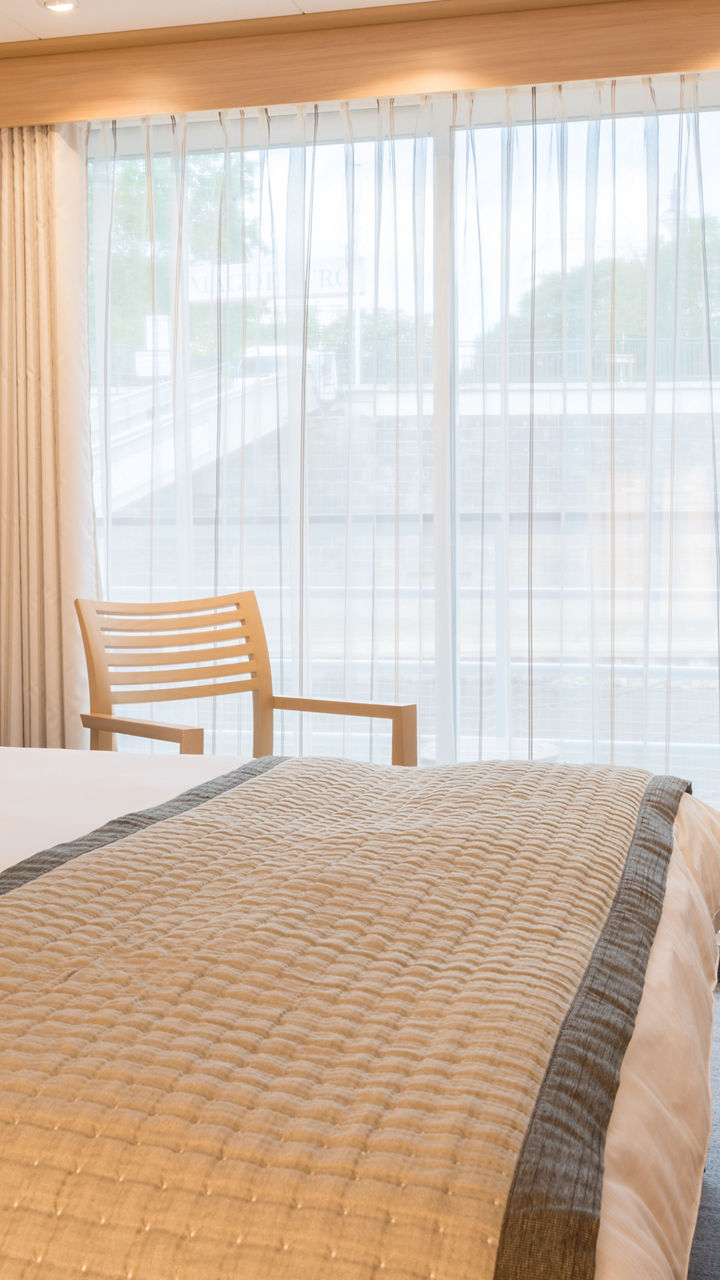 Modern hotel room with natural lighting