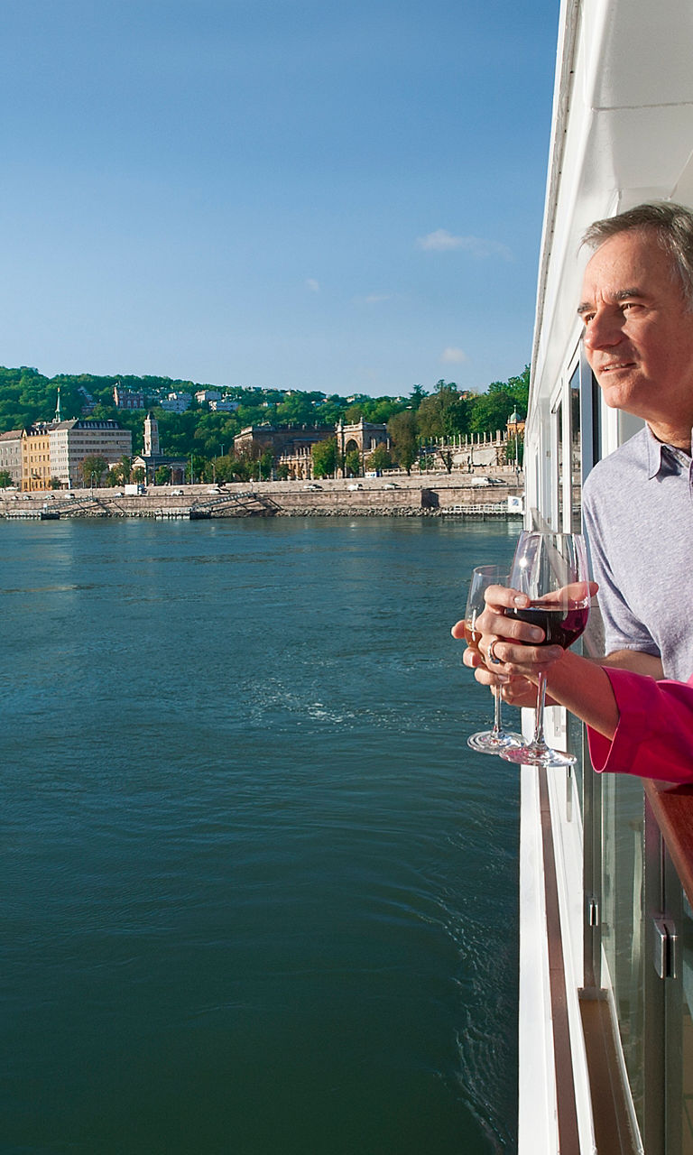 Couple enjoying river view on cruise