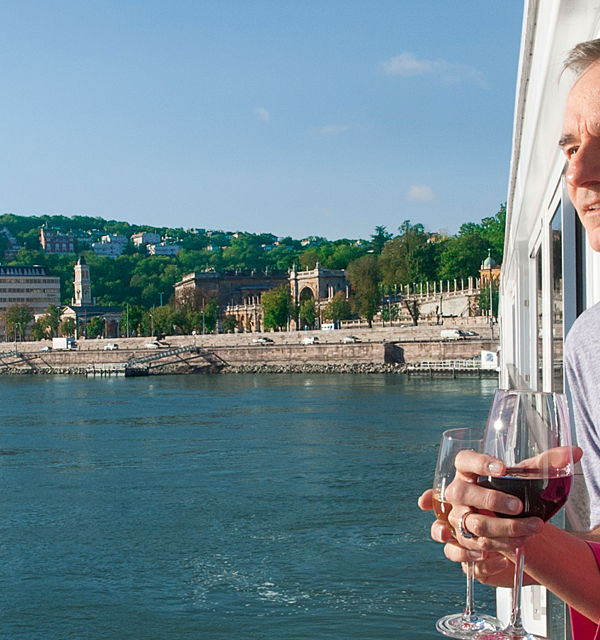 Couple enjoying river view on cruise