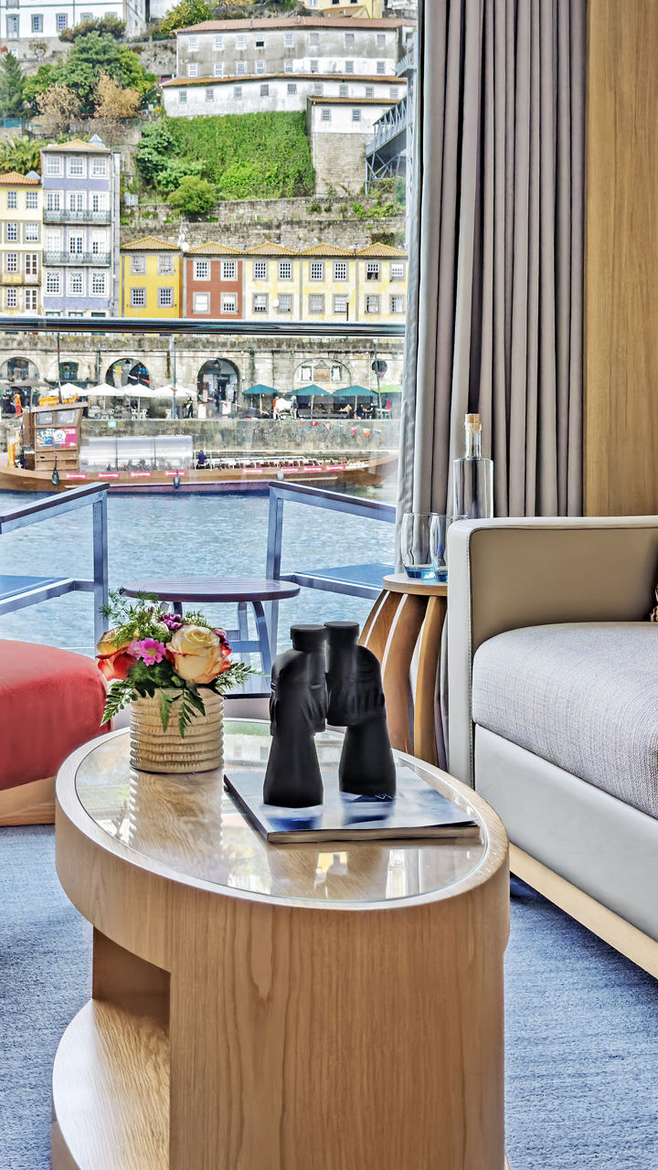 Modern riverside hotel room with city view