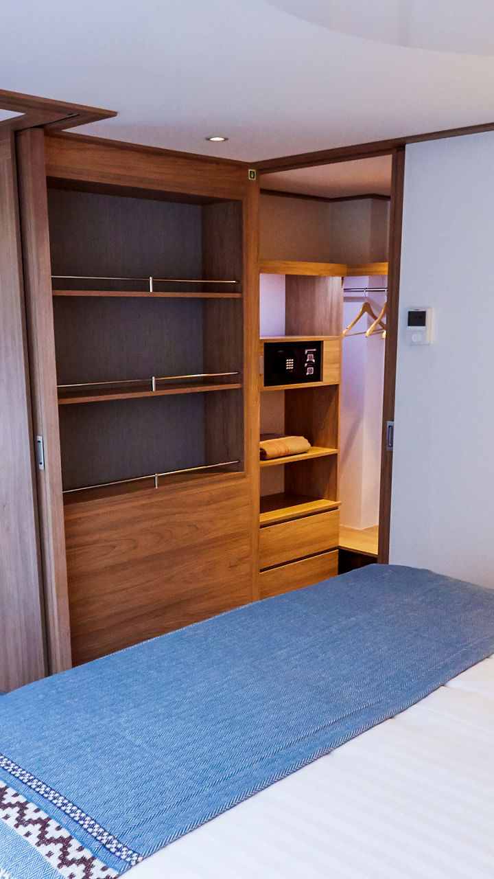 Modern hotel room with cozy decor