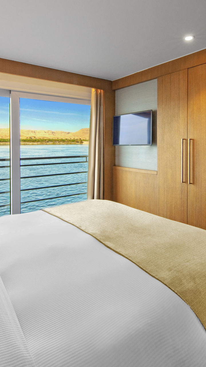 Modern hotel room with scenic water view