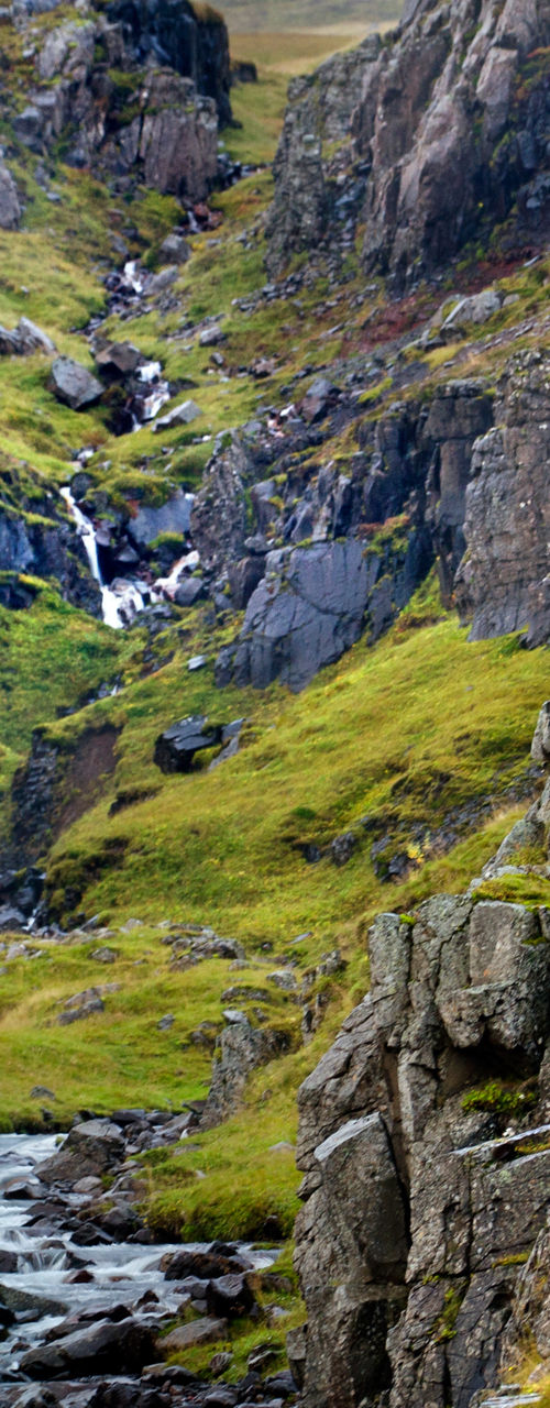 Scenic waterfall and rocky stream landscape