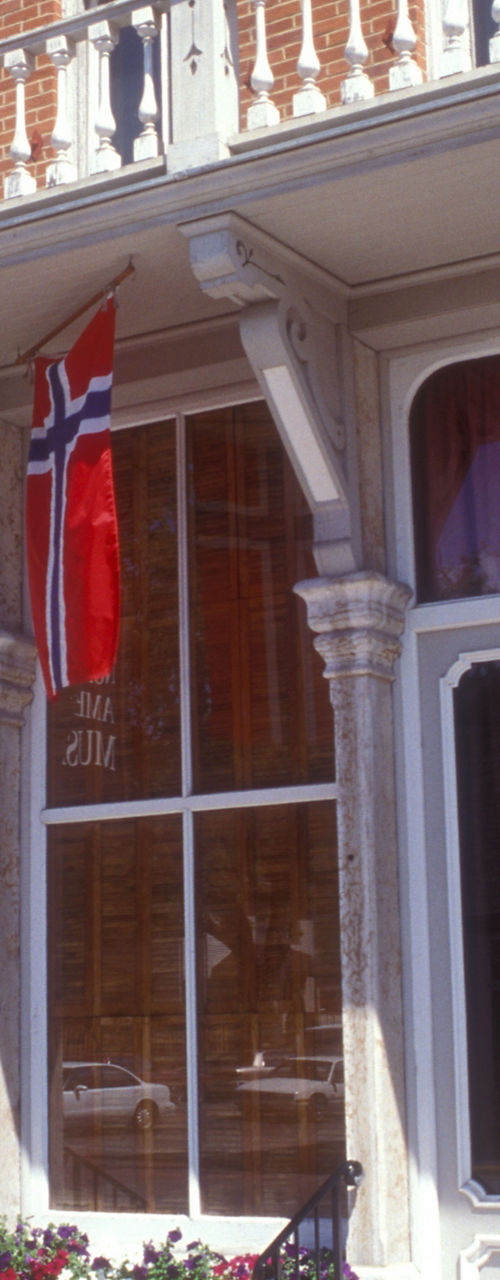 Norwegian American Museum with flags displayed