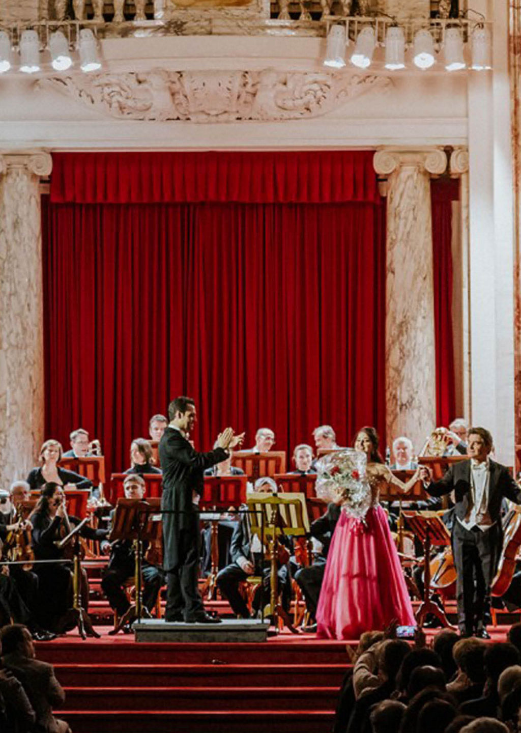 Orchestra performance in grand concert hall