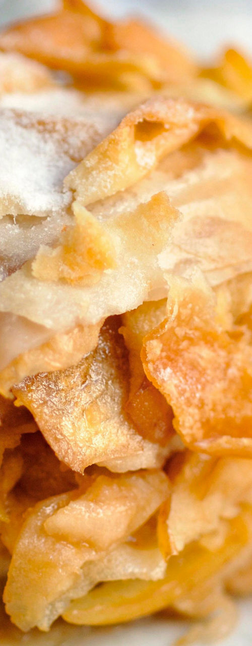 Golden apple strudel with powdered sugar