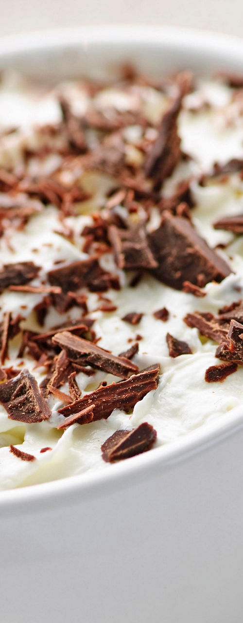 Hot chocolate with whipped cream and chocolate shavings
