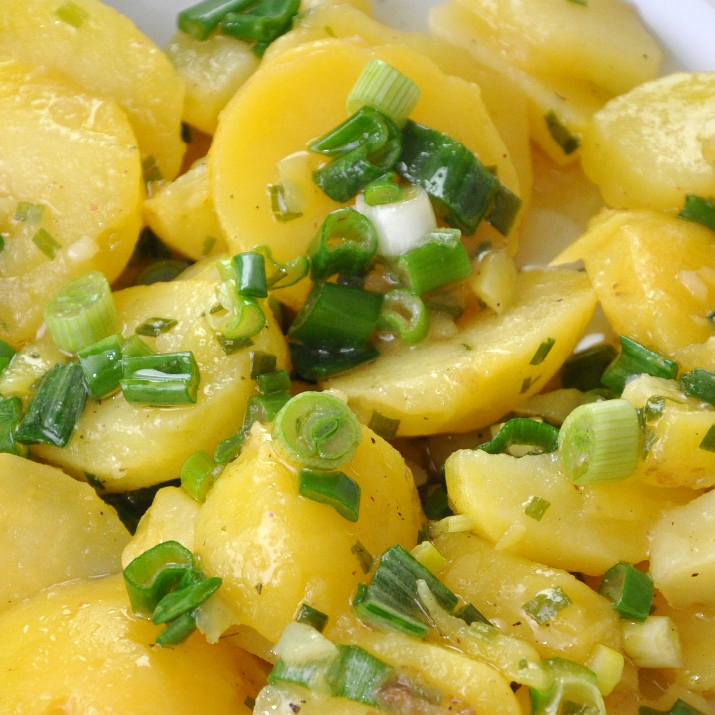 Fresh potato salad with green onions