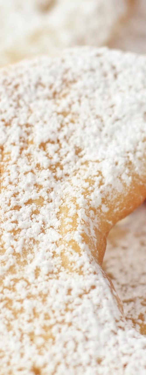 Powdered crescent cookies with holiday decor