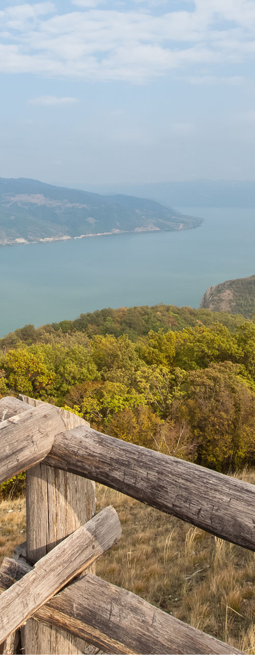 Scenic lake view from wooden railing