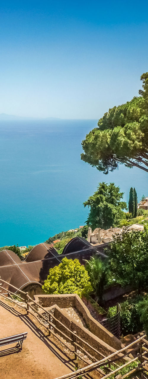 Scenic coastal view with lush greenery
