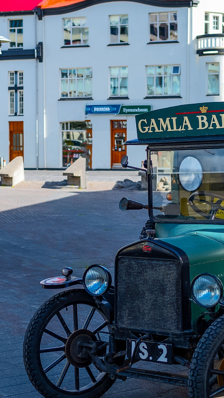 Vintage delivery truck in scenic town square