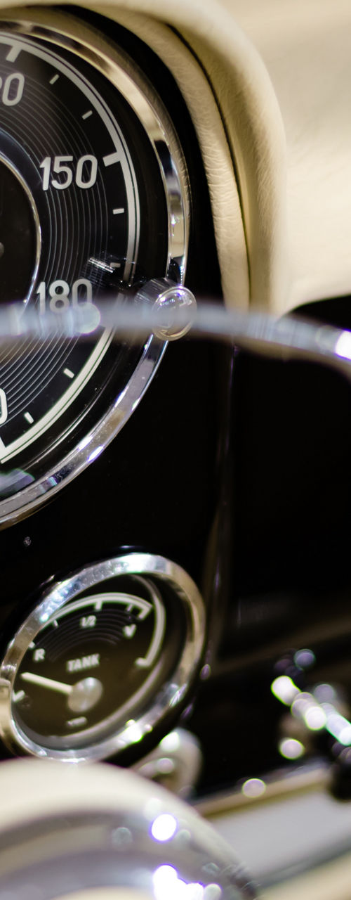 Vintage car dashboard with speedometer