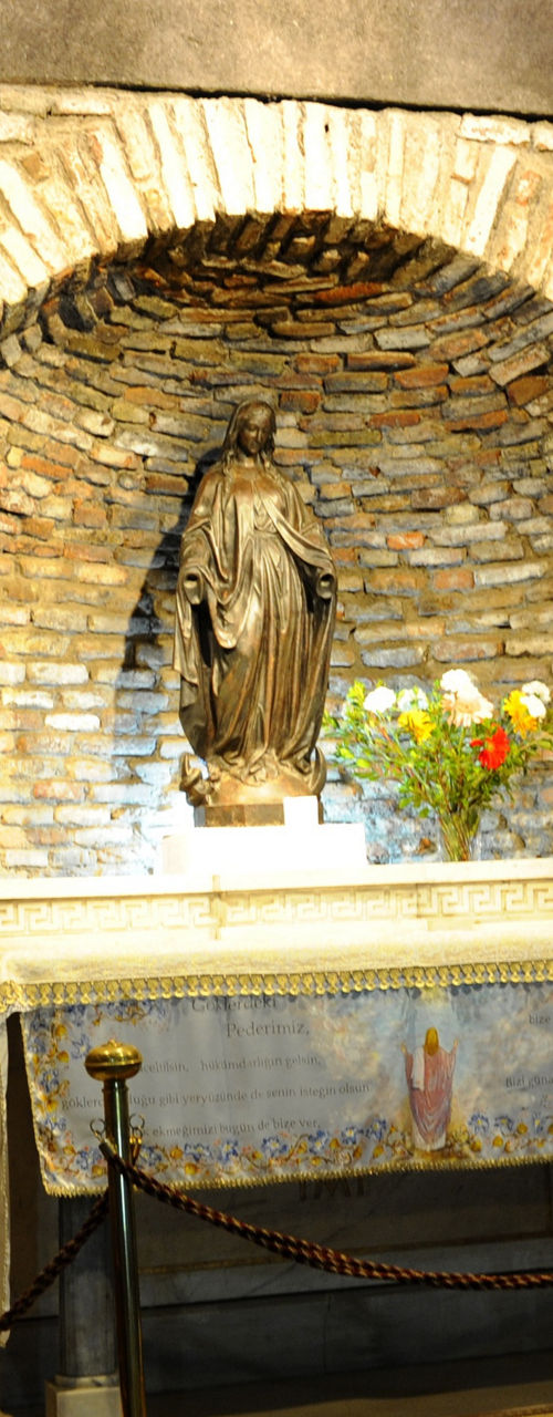 Historic stone altar in dimly lit chapel