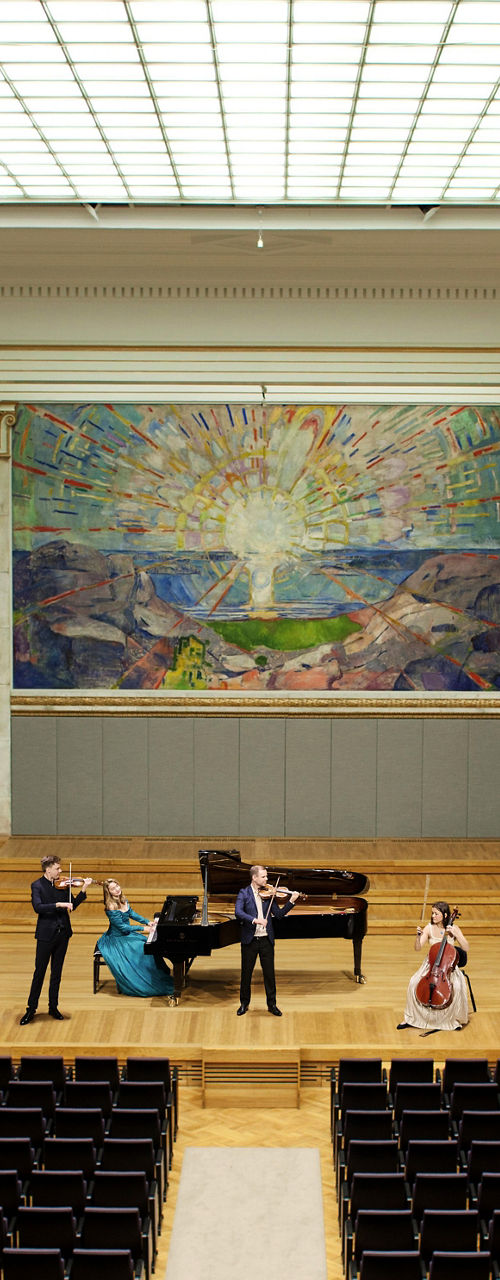 String Quartet Performing in Ornate Concert Hall