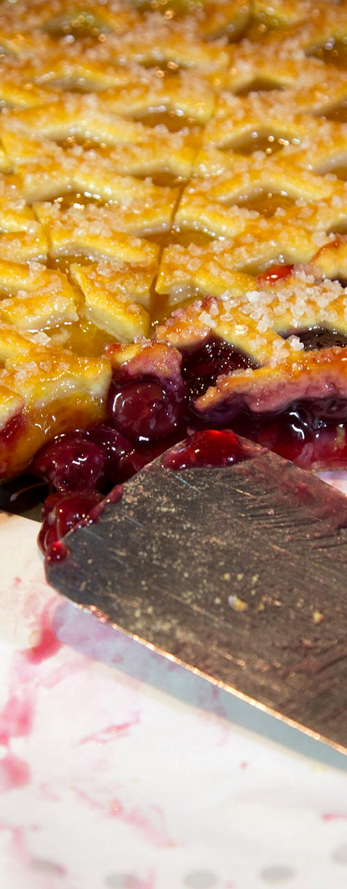Cherry lattice pie with serving knife
