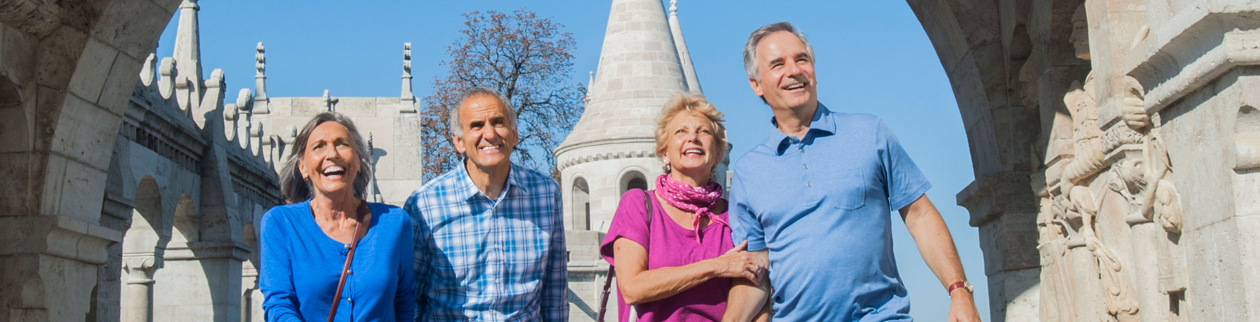 Group of seniors exploring historic architecture