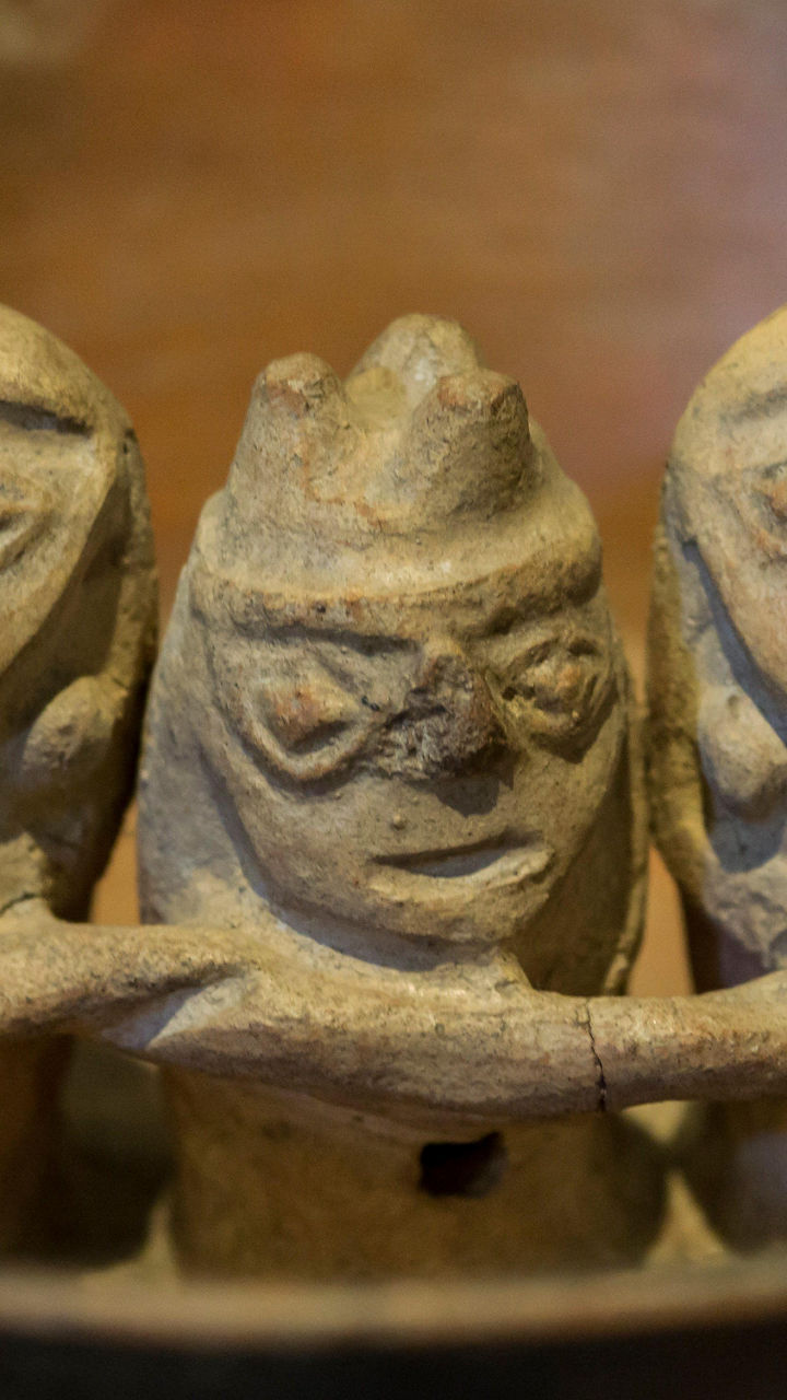 Ancient ceramic bowl with figurines